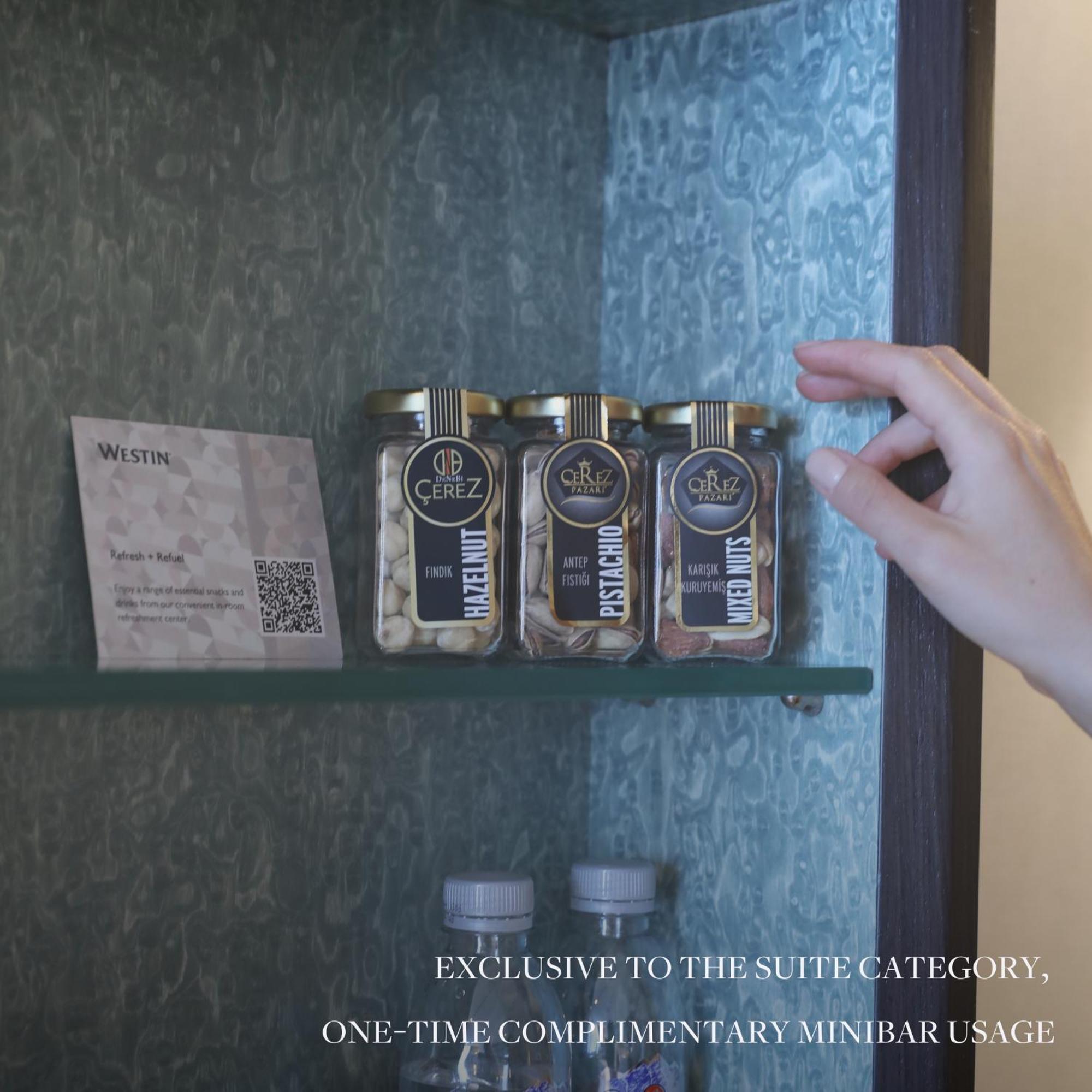 מלון The Westin Istanbul Nisantasi מראה חיצוני תמונה A hand selecting a spice from a spice rack